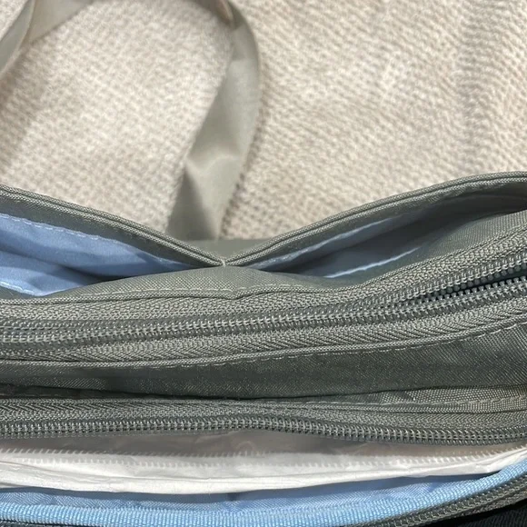 Baggallini. Brand new with tags. Grey with subtle cheetah print background. - Picture 12 of 12